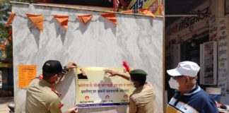 कोरोना जागरूकता अभियान नत्थूसर गेट क्षेत्र में पोस्टर चस्पा कर आमजन से की समझाइश